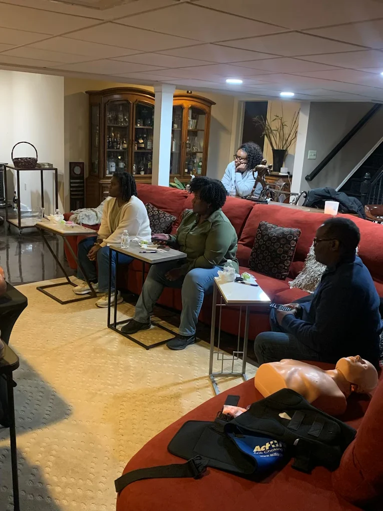 group cpr training, family completing cpr training